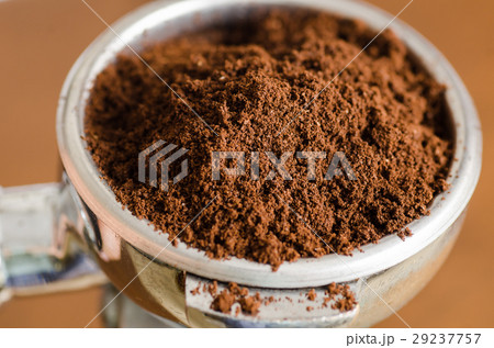 Ground coffee in a portafilter for coffee making Ground coffee in a portafilter for coffee making 29237757