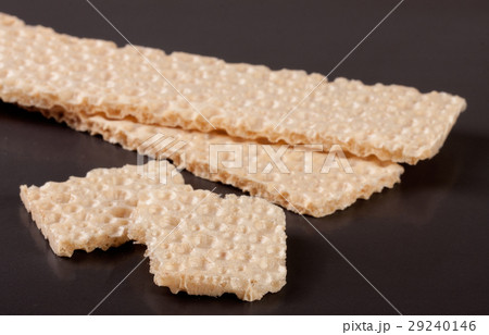 two grain crispbreads on a dark background two grain crispbreads on a dark background 29240146