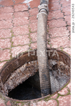 pumping sewage from the drain hole 29240543