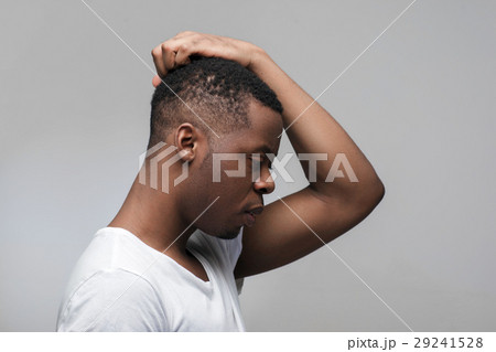 African man thinking. Concentrated on thoughts. African man thinking. Concentrated on thoughts. 29241528