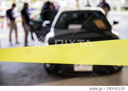 blank police line protect vehicle in crime scene 29242110