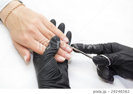 Woman doing manicure beauty salon  29246562