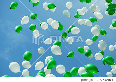 green and white balloons in the sky green and white balloons in the sky 29246964