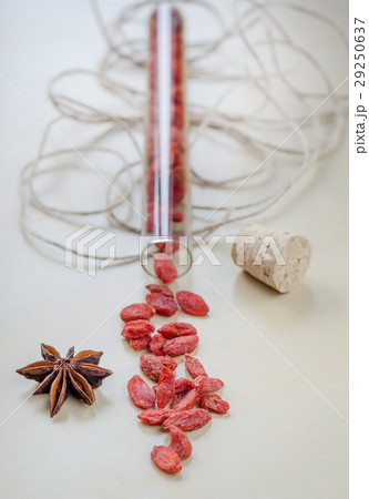 Goji berries and clove on a wooden Board. Goji berries and clove on a wooden Board. 29250637
