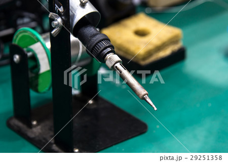 soldering iron and tin string 29251358