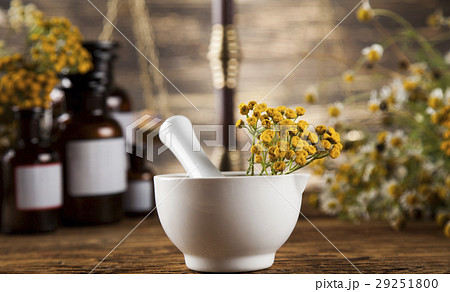 Herbal medicine on wooden desk background 29251800