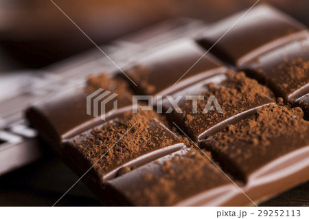 Dark homemade chocolate bars and cocoa pod Dark homemade chocolate bars and cocoa pod 29252113