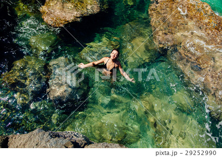girl in the sea lagoon aerial top view girl in the sea lagoon aerial top view 29252990