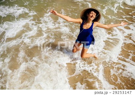 girl in vietnamese hat on the beach top view girl in vietnamese hat on the beach top view 29253147