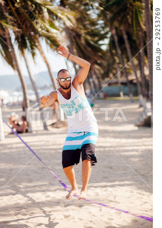 man balancing on the rope 29253769