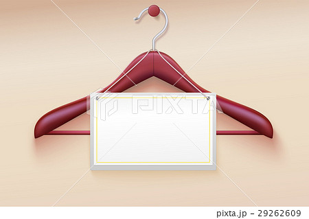 Wooden hanger with tag isolated on cream Wooden hanger with tag isolated on cream 29262609