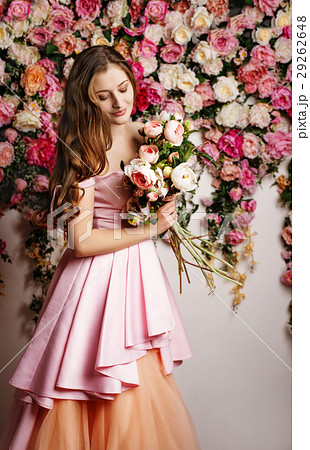Young beautiful girl at the flower interior 29262648