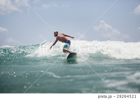 surfer man surfing on waves splash actively 29264521