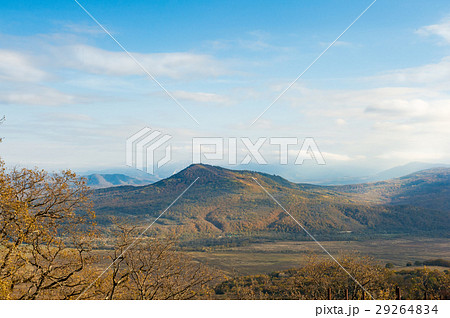 Panoramic view on faraway mountains in fall season Panoramic view on faraway mountains in fall season 29264834