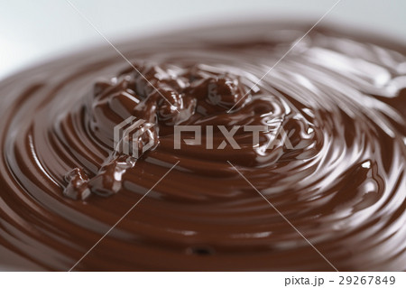 premium dark chocolate poured in bowl 29267849