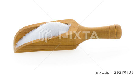 Salt in wooden scoop on white background Salt in wooden scoop on white background 29270739