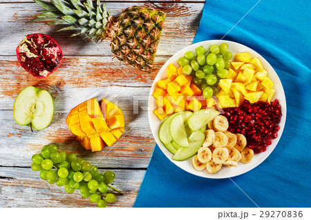 delicious fruit salad laid out on segments delicious fruit salad laid out on segments 29270836