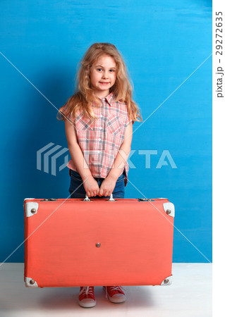 Child blonde girl with pink vintage suitcase ready Child blonde girl with pink vintage suitcase ready 29272635