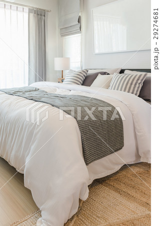 set of pillows and blanket on bed  29274681