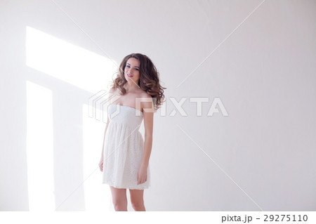 girl model posing in a white room girl model posing in a white room 29275110