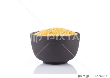 Dry millet isolated on white Dry millet isolated on white 29276084