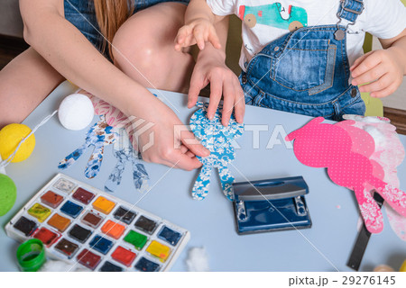 smilling boy making bunny for easter 29276145
