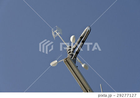 Anemometer or wind vane on a blue sky Anemometer or wind vane on a blue sky 29277127