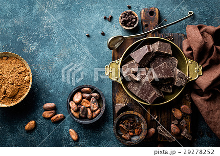 Dark chocolate pieces crushed and cocoa beans 29278252