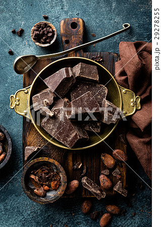 Dark chocolate pieces crushed and cocoa beans 29278255