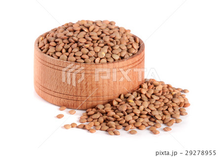 Lentils in a wooden bowl isolated on a white Lentils in a wooden bowl isolated on a white 29278955