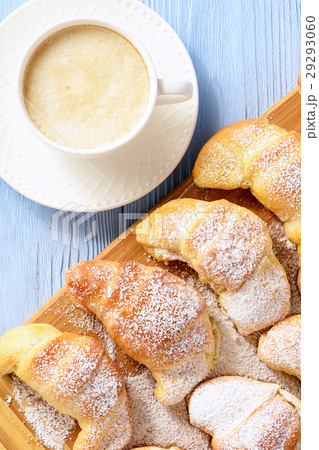 Homemade sweet croissants stuffed with cheese. Homemade sweet croissants stuffed with cheese. 29293060