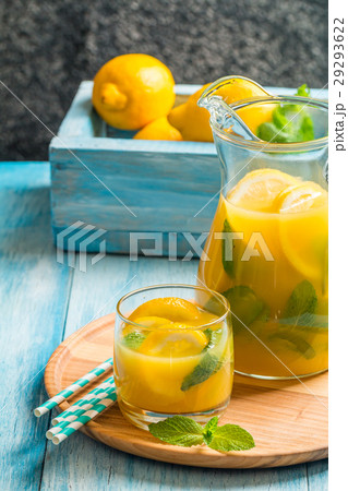 Lemonade in the jug and glass 29293622