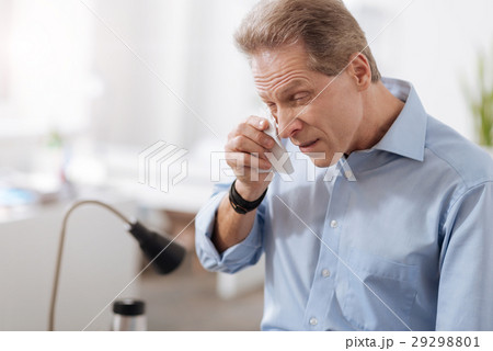 Sick male person wrinkling his forehead 29298801