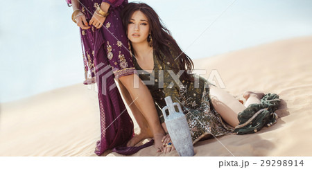 Thirsty women traveling in desert. Lost in desert 29298914