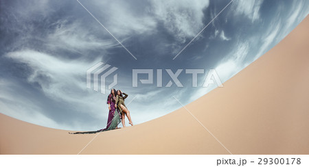 Women in desert landscape. Travel concept. Women in desert landscape. Travel concept. 29300178