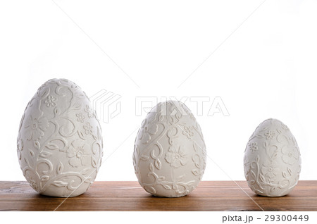 Easter decoration - white eggs on wooden board. Easter decoration - white eggs on wooden board. 29300449