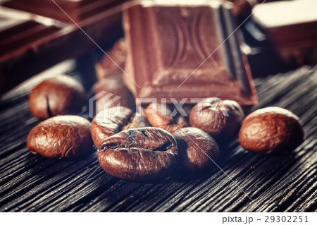 Close up of chocolate and coffee beans 29302251