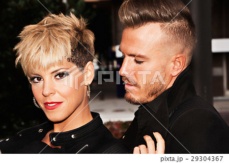 Young couple with trendy hairstyles. Young couple with trendy hairstyles. 29304367