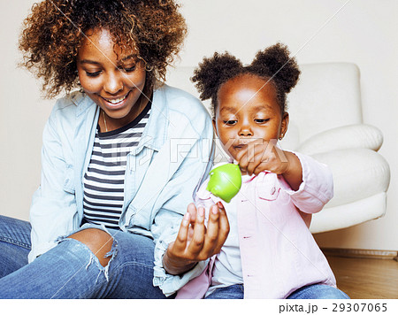 adorable sweet young afro-american mother with 29307065