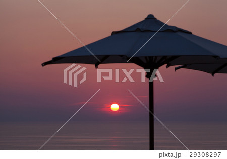 Summer dawn with beach parasol 29308297