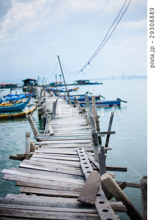 Wooden pier on the sea background Wooden pier on the sea background 29308889