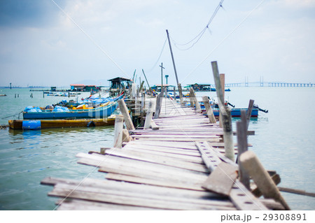 Wooden pier on the sea background Wooden pier on the sea background 29308891