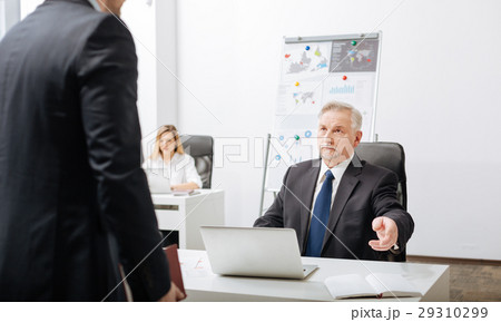 Angry employer having conversation with employee Angry employer having conversation with employee 29310299
