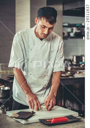 Preparing sushi set in restaurant kitchen 29311637