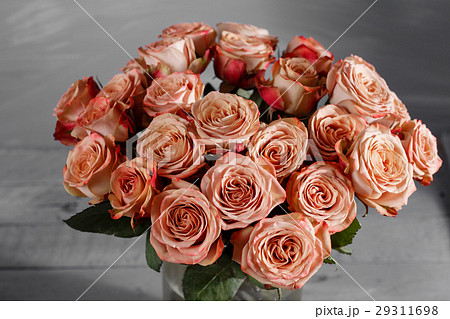 Flowers. Bouquet of capuchino roses on wooden 29311698