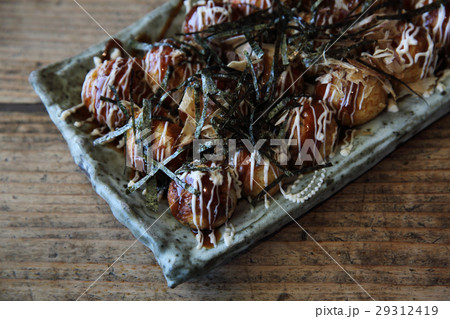 Takoyaki on wood background 29312419