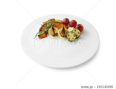 メイン料理をはなやかに彩る付け合わせの写真素材