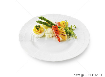 メイン料理をはなやかに彩る付け合わせの写真素材