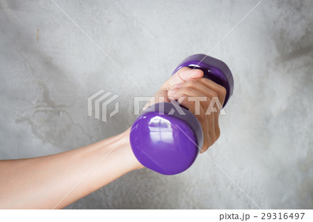 Woman Hand Holding Violet Dumbbell Woman Hand Holding Violet Dumbbell 29316497