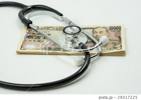 concept of stethoscope and money on isolate 29317225